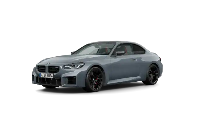 Graues BMW 2er Coupé vor schwarzem Hintergrund.